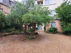 appartement au centre ville avec un beau jardin privé